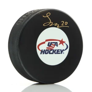 HUTL-USA-13B-0001 Lane Hutson Autographed Team USA Hockey Puck